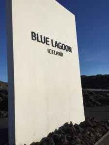 Blue lagoon in Iceland is where you will find the purest water for your skin, sign, black rocks