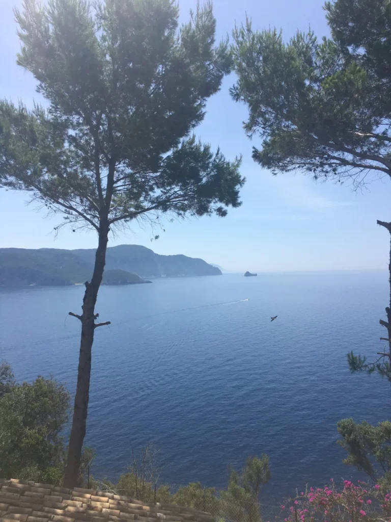 Renting a car in Corfu is worth it so you can explore the many hidden gems like Paleokastritsa Monastery