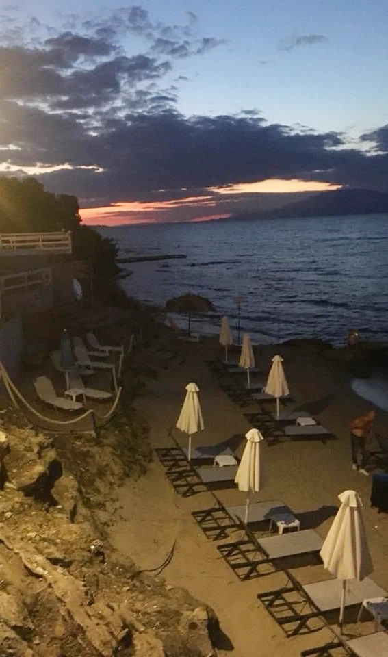 Is it difficult to drive in Corfu at night?- dark beach with sunset in Corfu