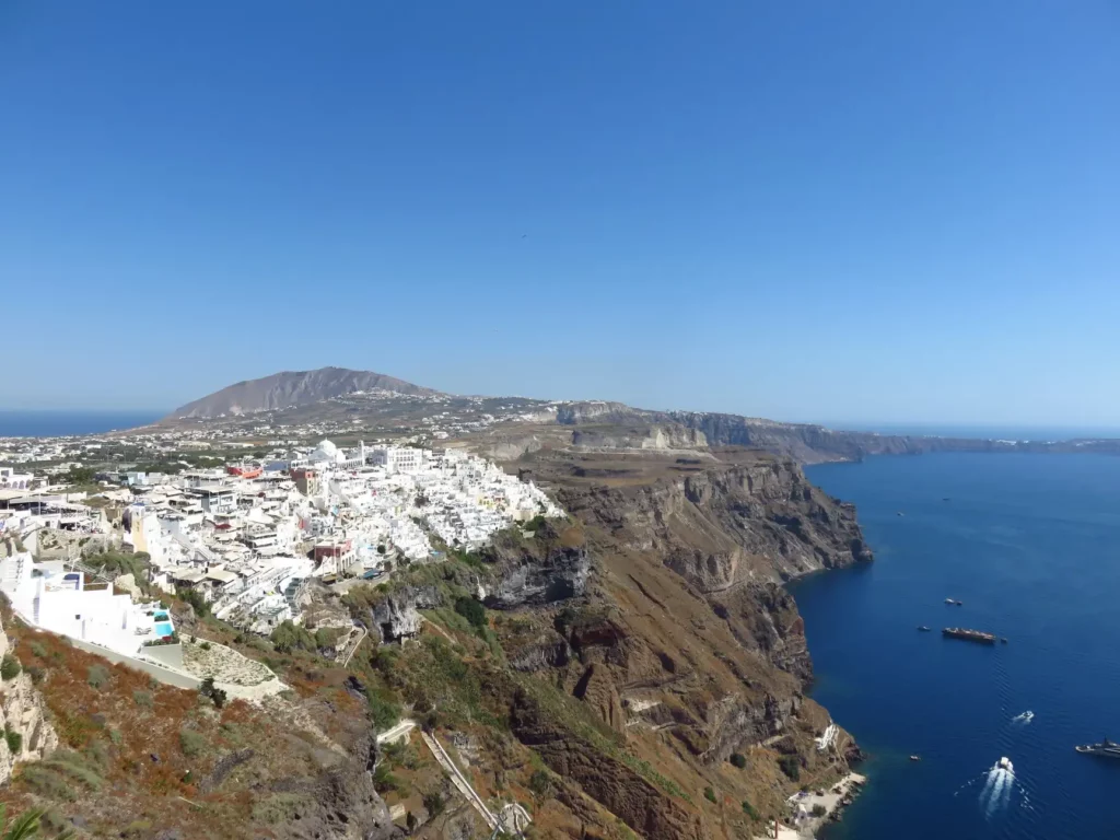 best road trips in Greece, Santorini- coastal cliff, blue waters, Greece