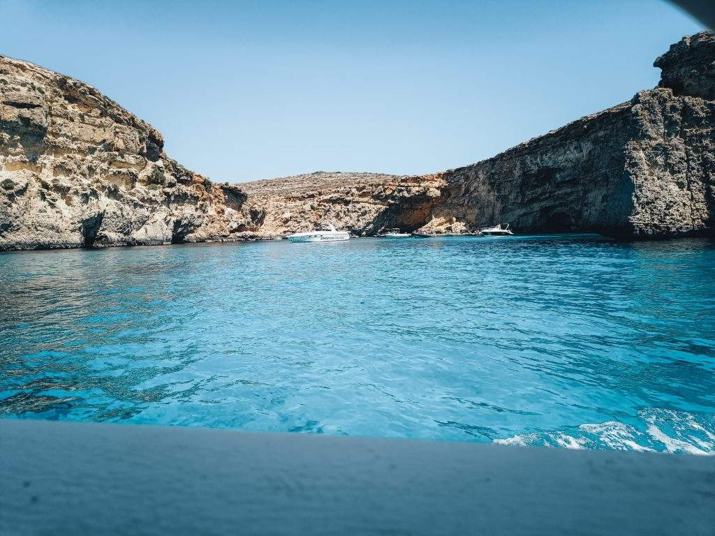 Half-Day Blue Lagoon, Comino and Gozo Boat Trip, blue water, cliffs, cove, Malta