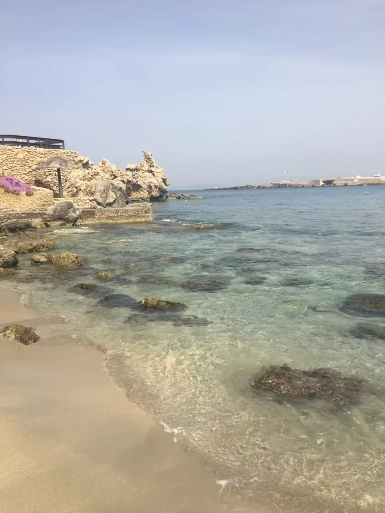 Snorkeling & Beaches Private Boat Tour Malta, clear waters, yellow sand, rocks, Paradise bay, Malta
