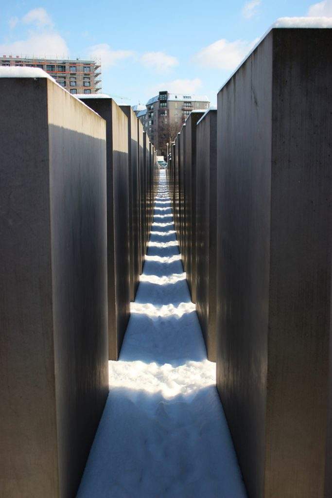 Holocaust memorial Berlin, Holocaust Tours Germany- tall grey blocks, snow, sky