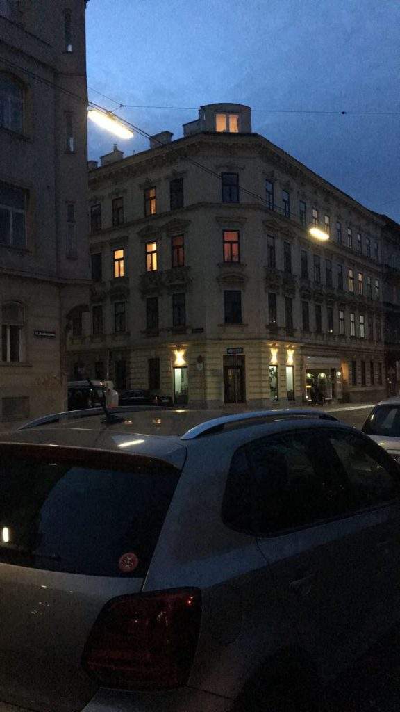 Ghost Tour Around Vienna- dark street, car, tall building, street lights, Vienna Austria