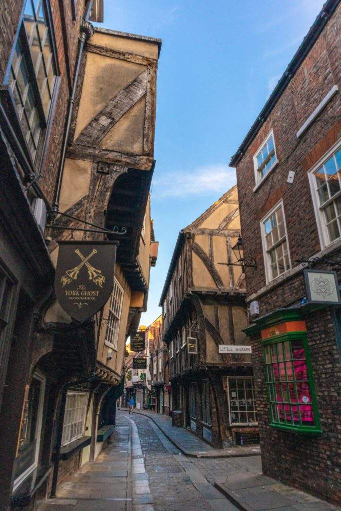 Ghost Tours In Europe, York- old tall buildings, medieval street, England, UK
