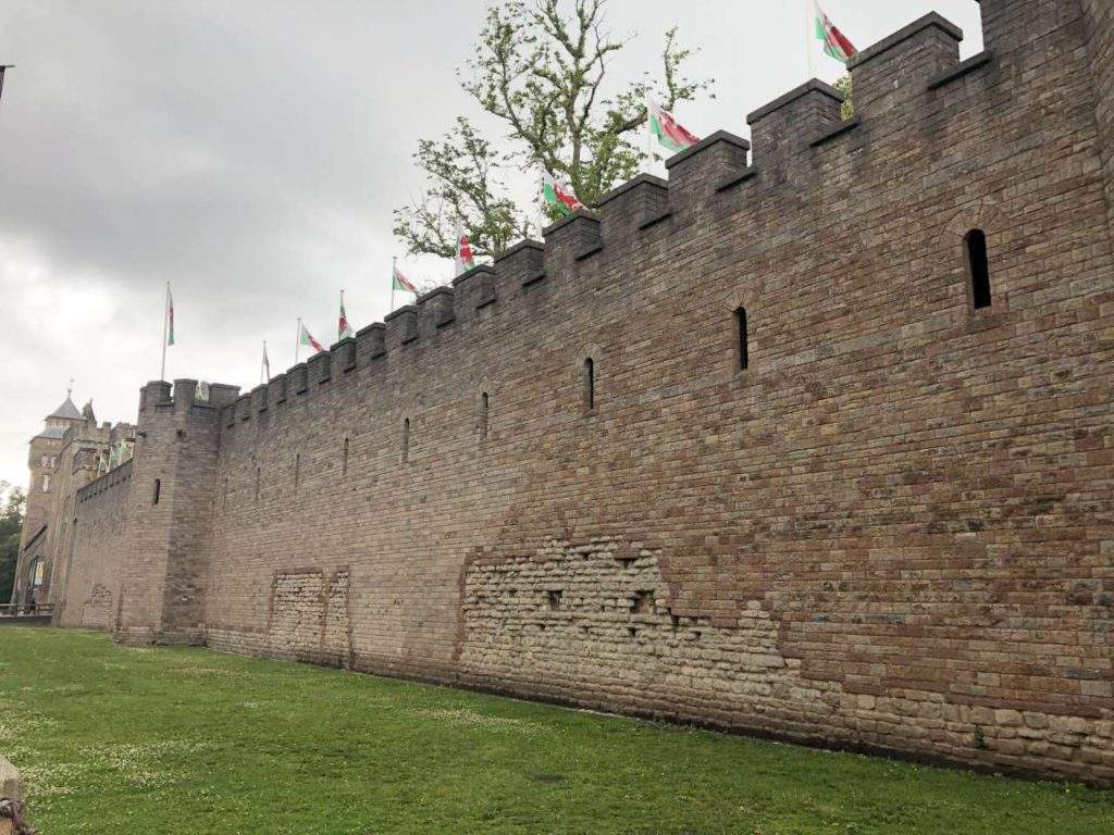 Cardiff Day Tour From London- Cardiff Castle Wall, green grass, sky, Wales, UK