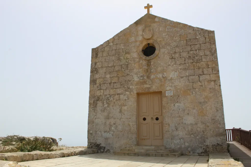 One of best walking tours in Malta for nature and the coast stops by the stone church that overlooks the cliffs