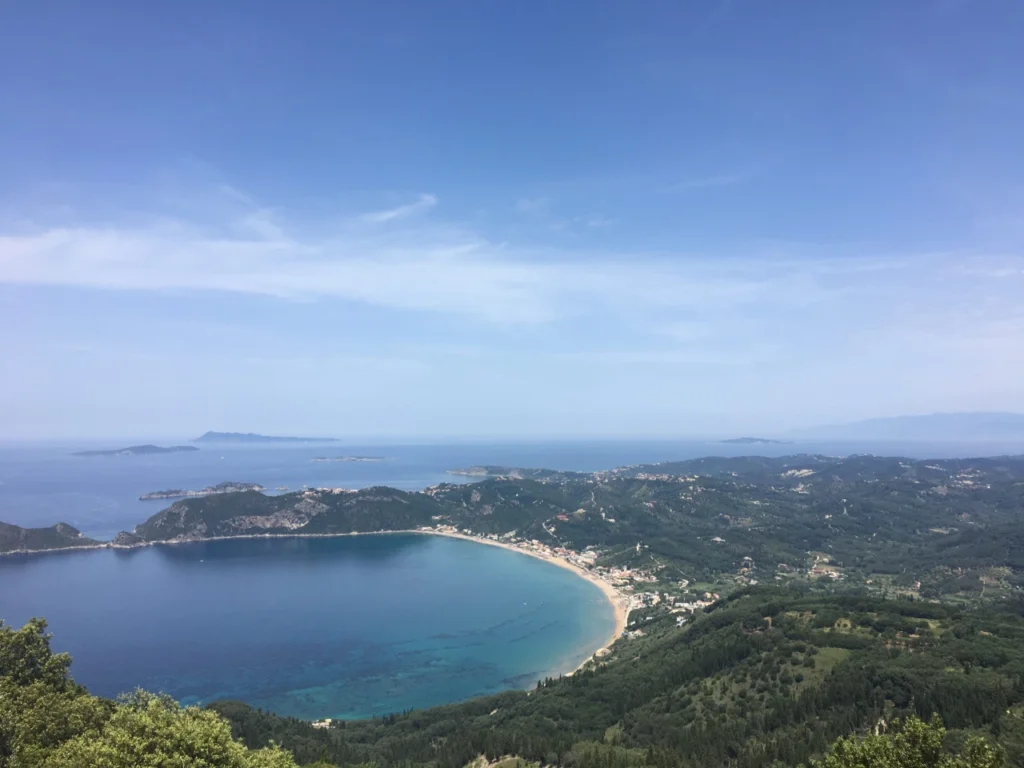 the mountain views in Corfu over look the blue waters and sandy coves. This is one reason alone you should rent a car here