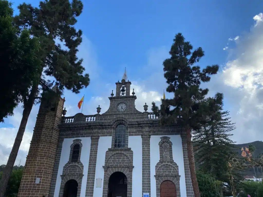Terror church with the bright blue skies of Gran Canaria is surrounded by ever green trees